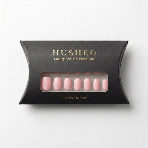 Pale Blush Hushed short oval reusable soft-gel press-on nail set.