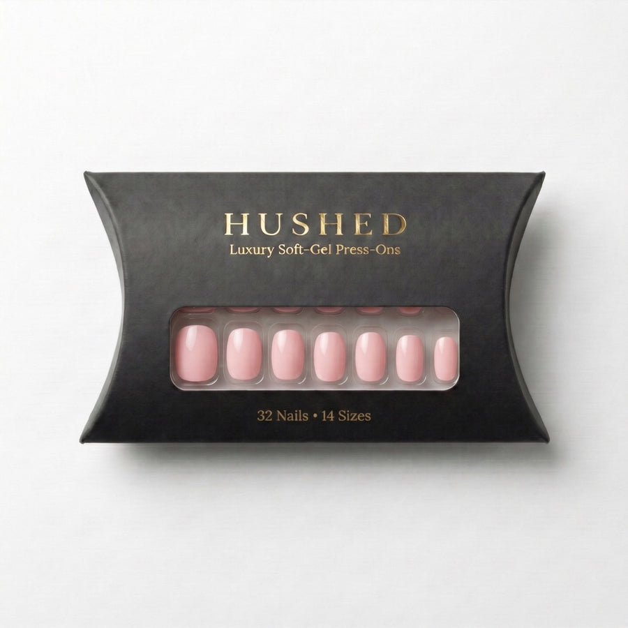 Pale Blush Hushed short oval reusable soft-gel press-on nail set.